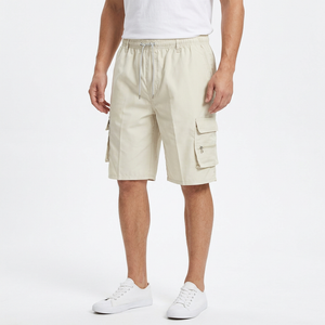 Beige work shorts on a male model