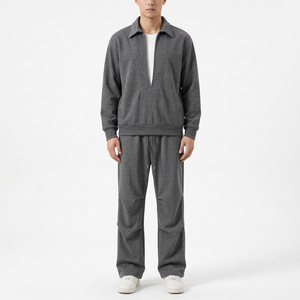 Male model wearing the Dark Gray collared top and straight-leg pants set