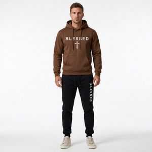 Male model wearing the reference-matched coffee brown hoodie with black pants
